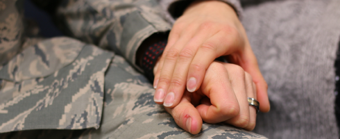Military Members Holding Hands
