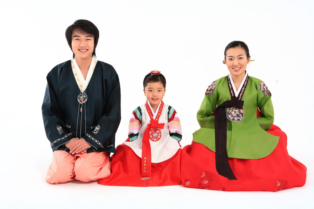 Korean family in traditional clothes